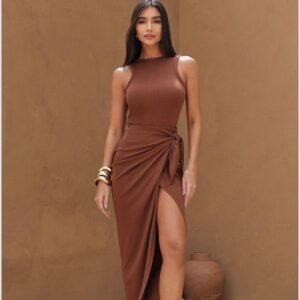 Woman in brown dress with slit.