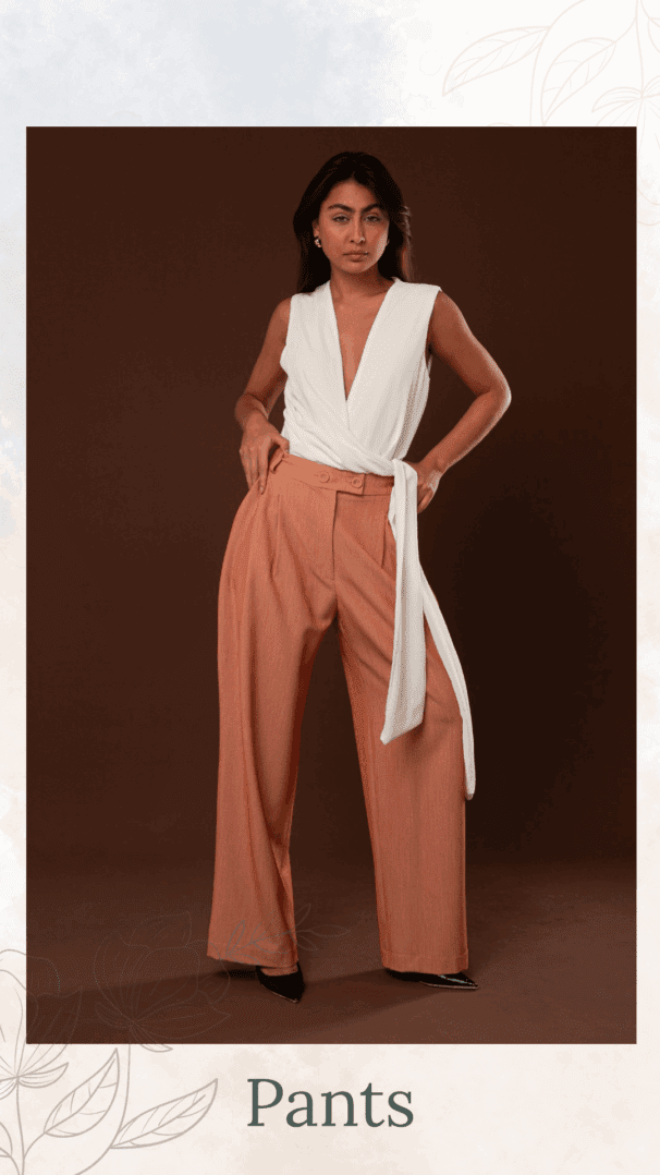 a woman in white top and banner pants