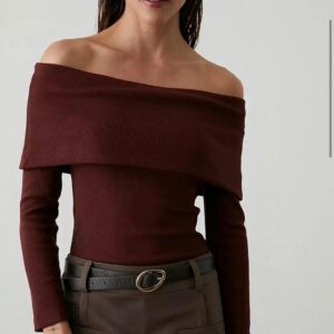 Woman in off-shoulder top and skirt.